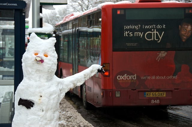 Snowman at Summertown bus stop in Oxford, UK